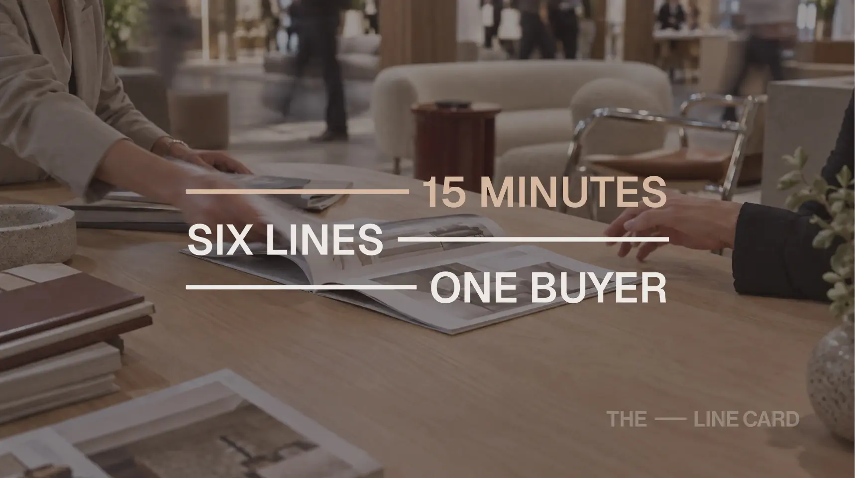 Independent rep and buyer working through catalogs at market, captioned fifteen minutes, six lines, one buyer
